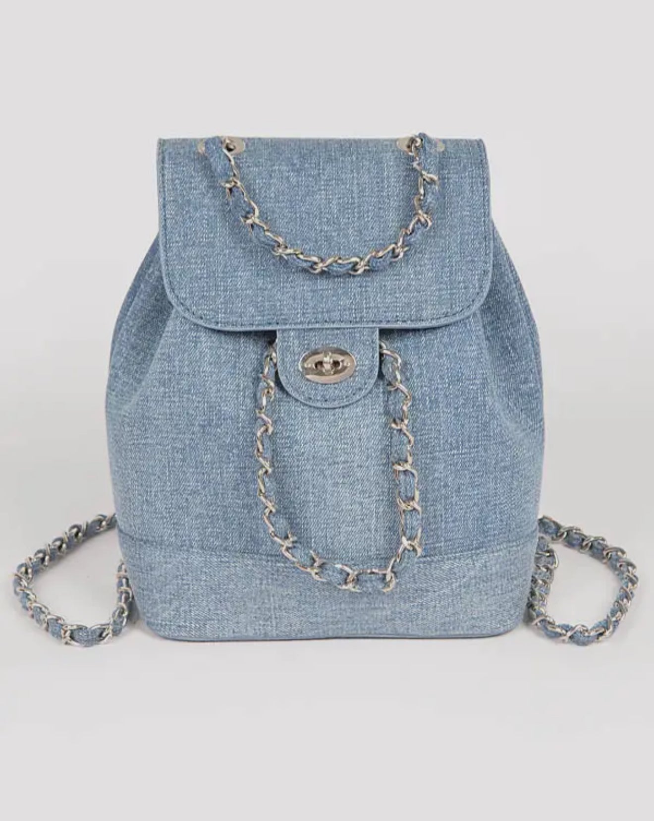 Denim backpack with chain details on a white background