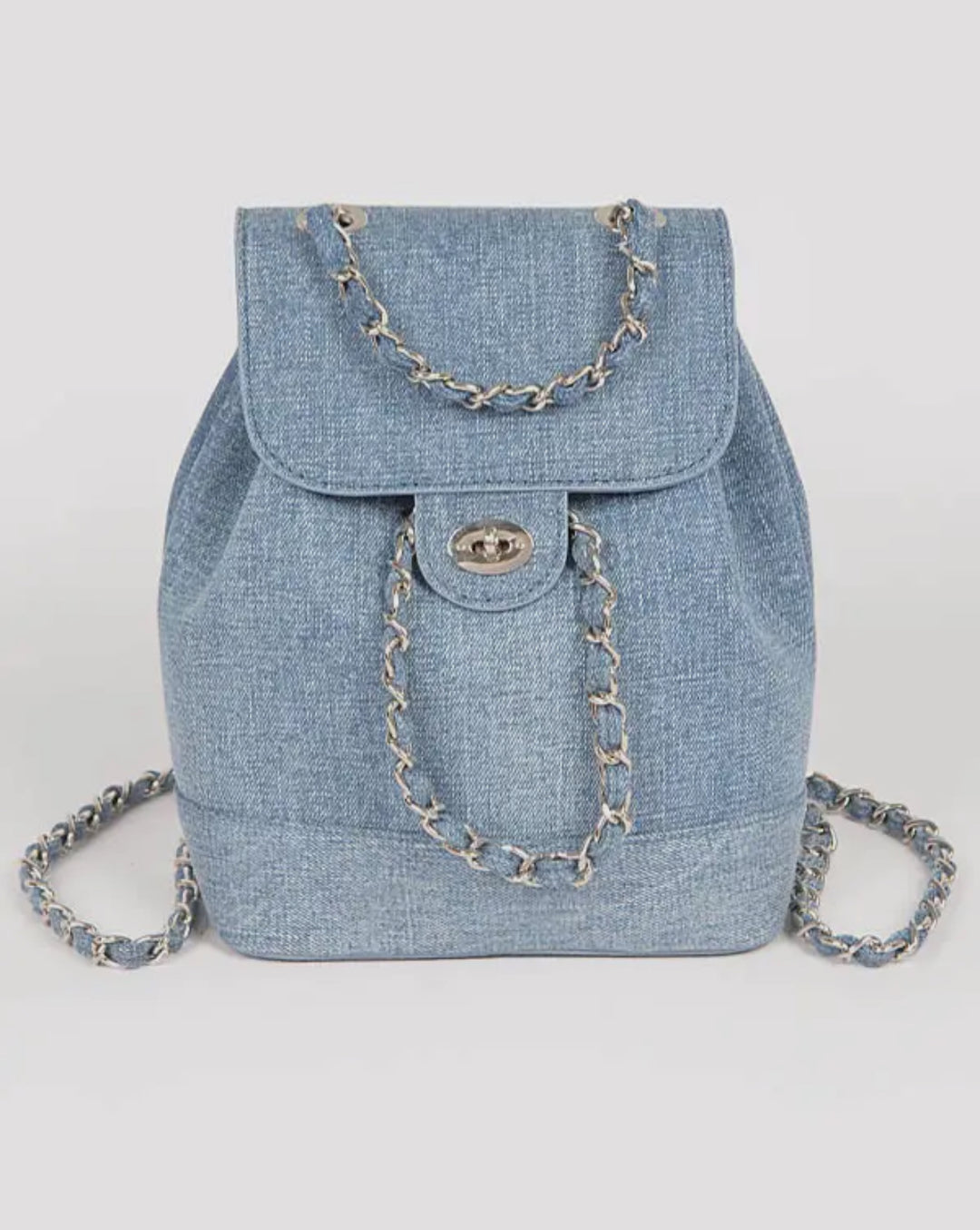 Denim backpack with chain details on a white background