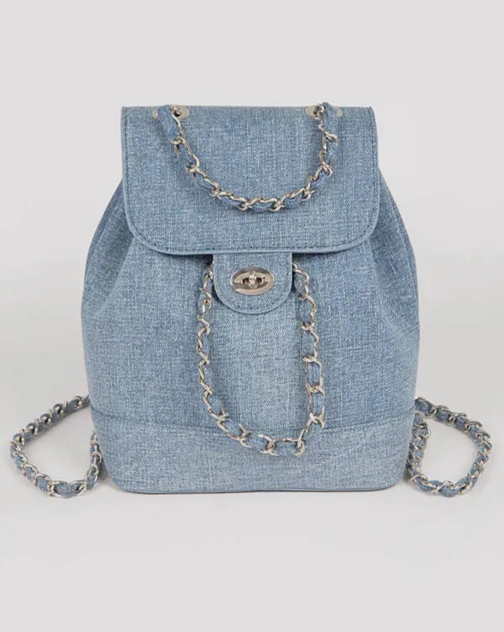 Denim backpack with chain details on a white background