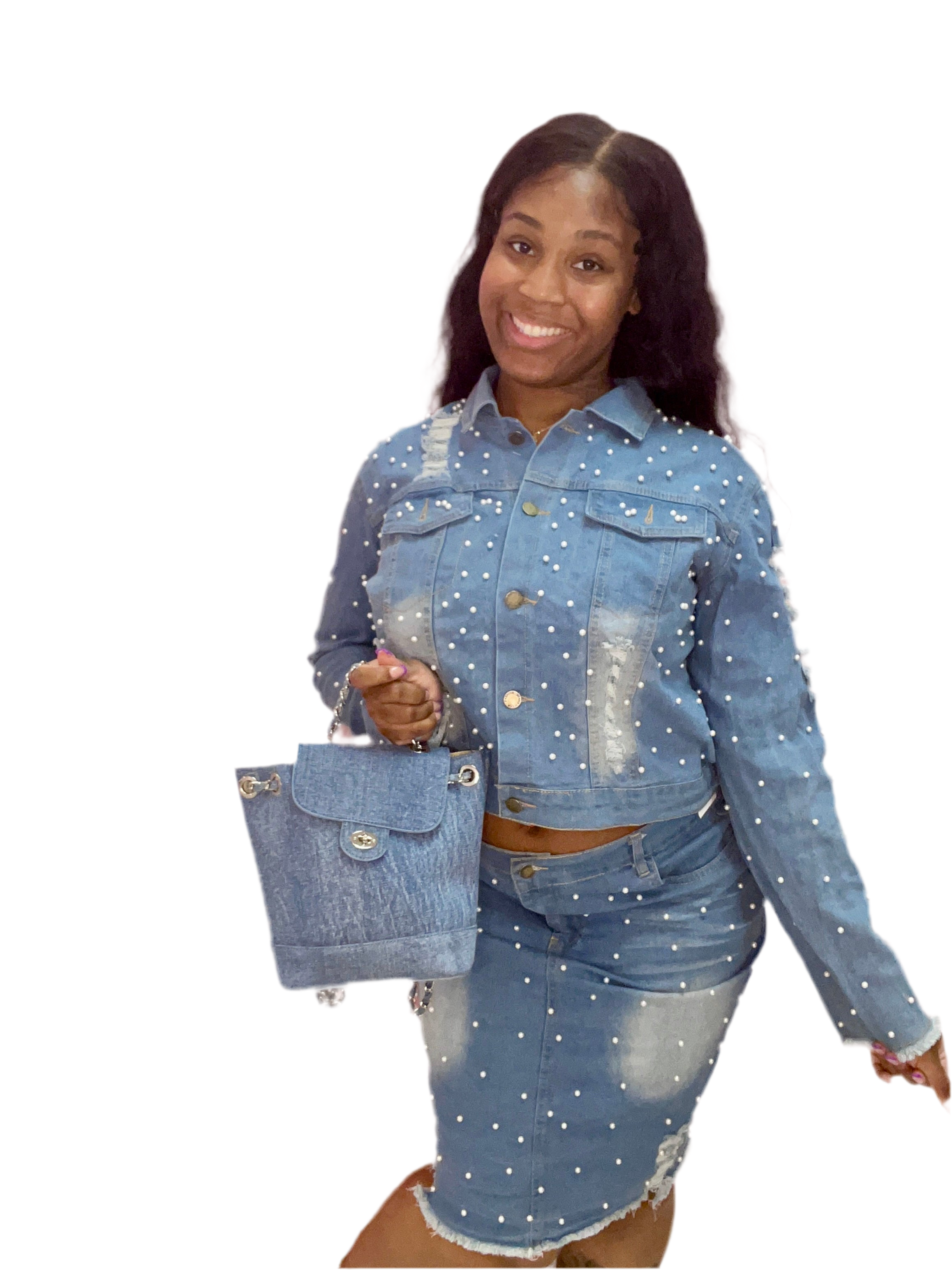 Woman wearing a denim outfit with a matching bag on a white background